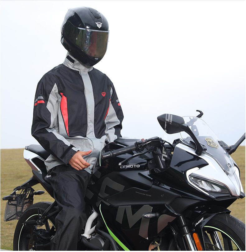 Rider wearing SN-010 on a sport bike — side view