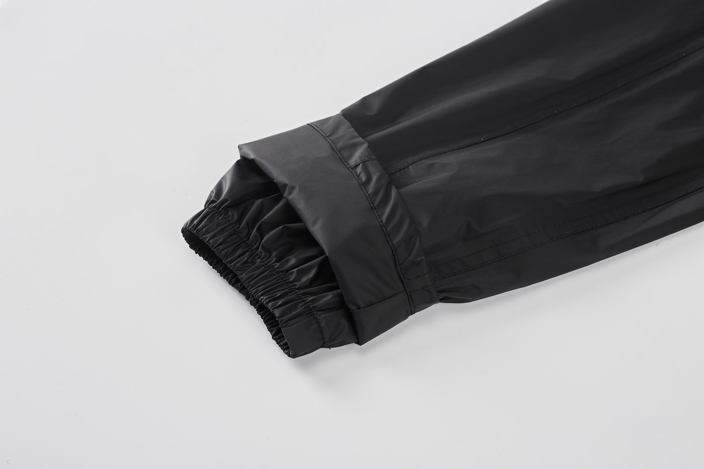 Inner elasticated cuff on sleeve for water-tight seal