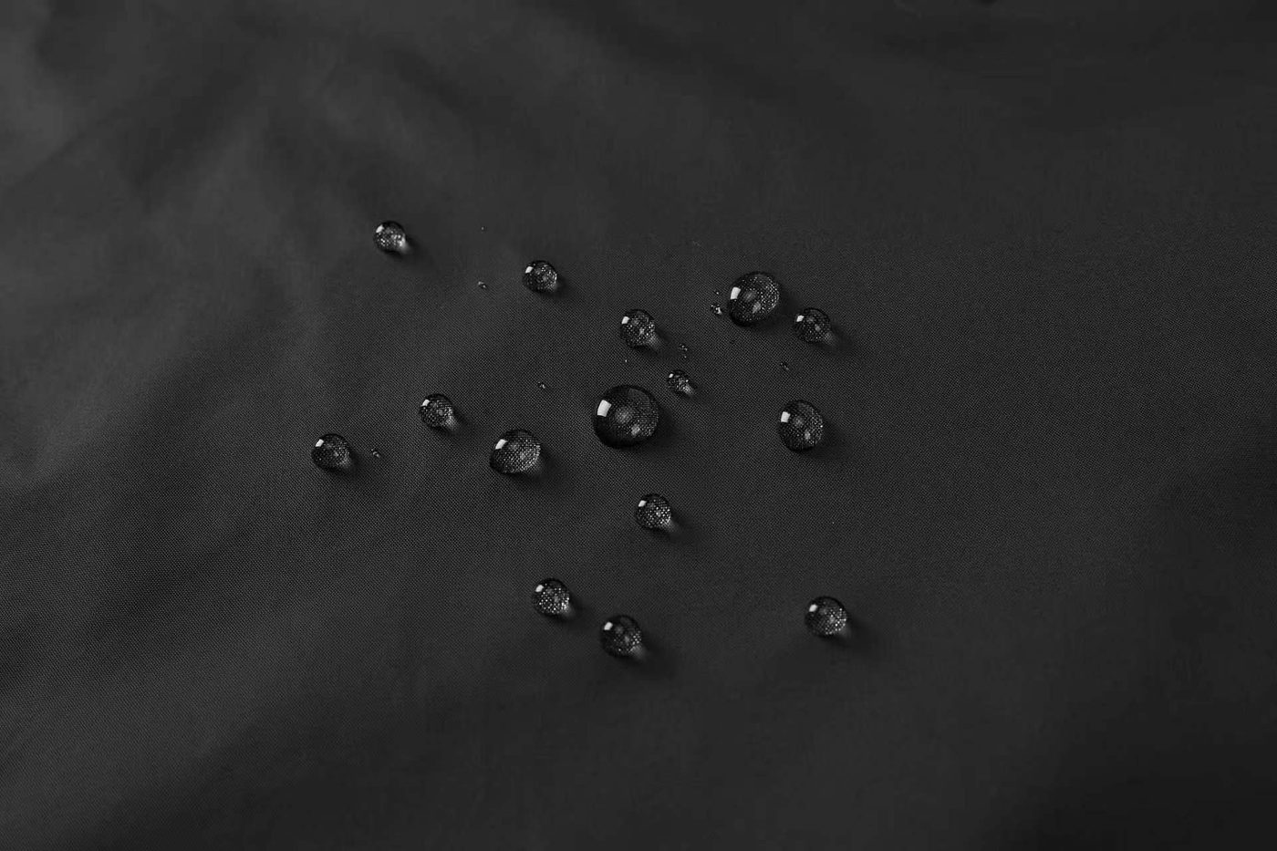 DWR water beading on the 210T Nylon Taffeta PU-coated face fabric — water beads and rolls off
