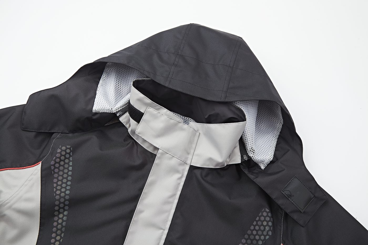 High collar with hook-and-loop chin guard and mesh-lined hood