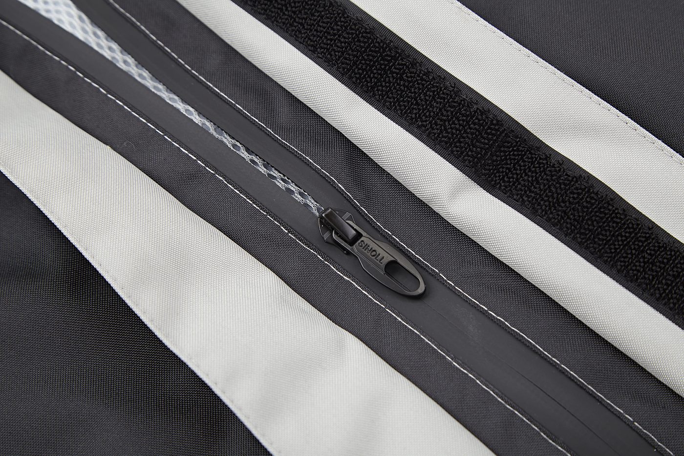 SINOLL-branded 5# nylon waterproof zipper slider engraved with MOTOSINOLL under the storm flap